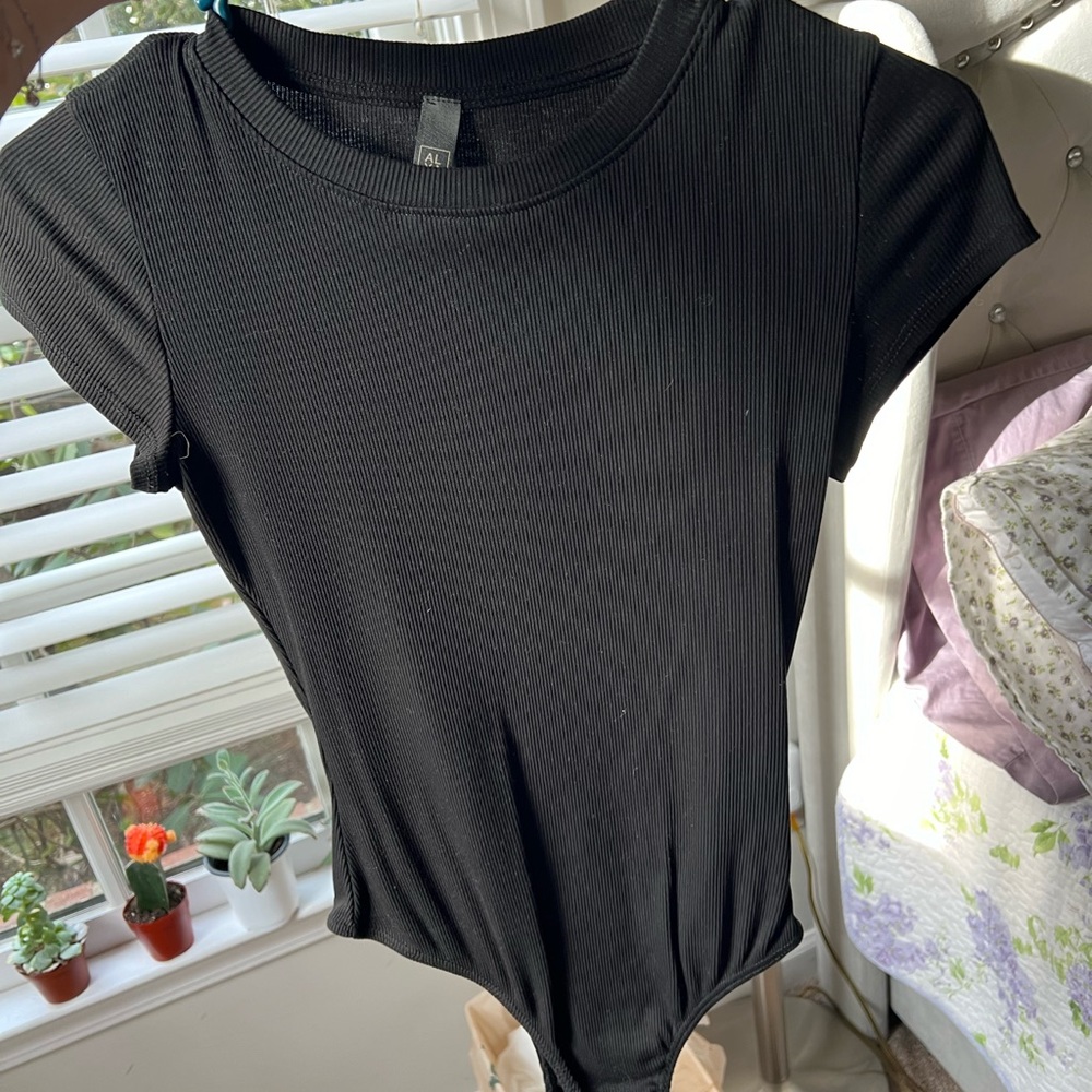 Super cute black body con body suit